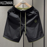 HLCOMAN夏季轻薄透气时尚速干休闲短裤男宽松百搭拼接潮流运动五分裤