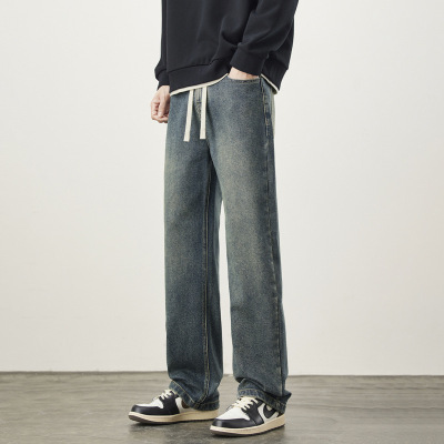 柔软舒适抗皱松紧腰牛仔裤男生新款秋冬简约抽绳流行弹力长裤男士