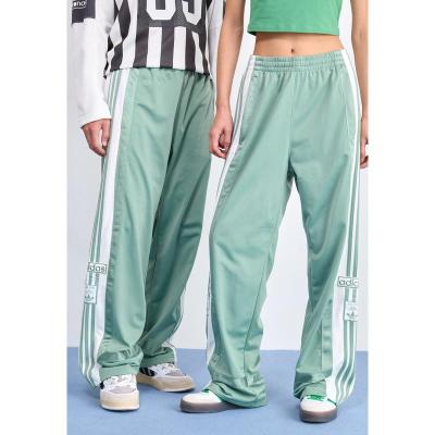 Adidas女款休闲运动裤经典银绿色弹力松紧腰侧口袋设计
