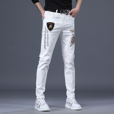 男士休闲牛仔裤子韩版刺绣烫钻直筒修身弹力小脚水洗白色牛仔裤男