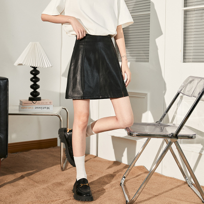 [3件8.5折101.9元,叠加优惠券]唐狮半身裙女秋季新款皮裙A字裙遮胯显瘦高腰开叉PU黑色半裙