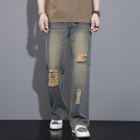 春夏微喇裤男高级感休闲宽松街潮美式破洞痞帅男士复古牛仔裤