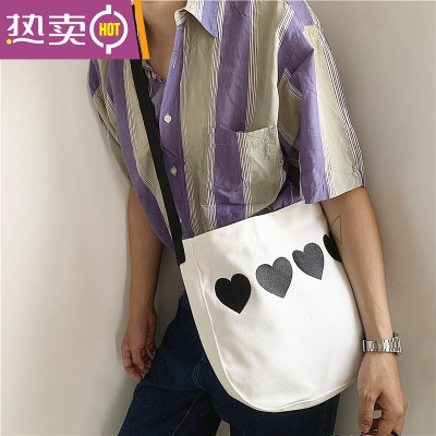 NEWLAKEOK2021潮流原创爱心ins风日韩版斜挎帆布包女文艺小众学生书包男