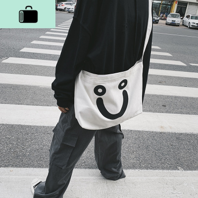 丑萌搞怪帆布包韩版ins超火可爱笑脸大容量学生上课单肩斜挎包男NEWLAKE