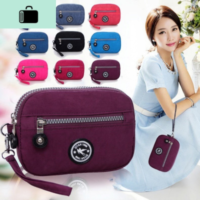 韩版手拿布包包女手提包简约百搭帆布手机包个性迷你小布袋零钱。NEW LAKE