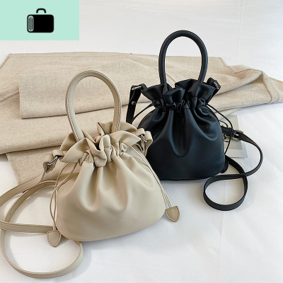日系迷你抽带水桶包简约手提单肩包潮学生斜挎包女百搭ins小包包NEW LAKE女斜挎包