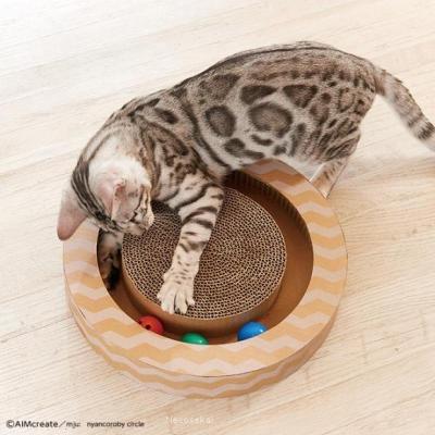 丸丸家 日本-喵乐比猫抓板发声玩具铃铛洞洞魔球盒飞碟款现货