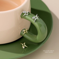 s925纯银北极星镂空星星耳钉女轻奢四爪单钻锆石通勤韩版耳饰批发送女朋友老婆情人节七夕生日礼物