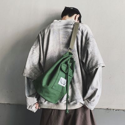 澈旅帆布斜挎包男士学生韩版ins潮牌嘻哈日系休闲简约圆筒小单肩包女