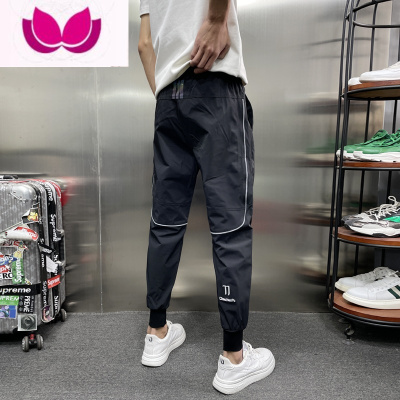 七斓休闲裤男夏季修身薄款冰丝速干运动裤网红潮流百搭束脚九分哈伦裤