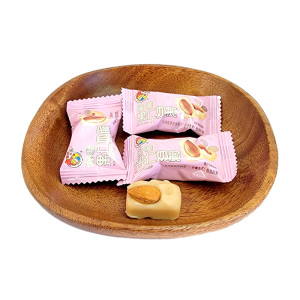 喔喔新品白桃果肉奶脆果仁奶脆糖果结婚喜糖婚庆水果糖果散装批发零食500g